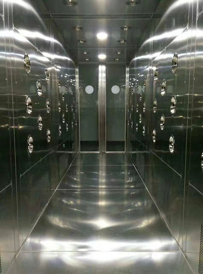 檢查風淋室風機是否正常工作，是否有異物堵塞。